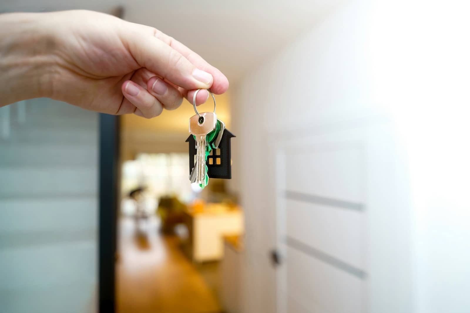 Handing over the keys at the front door on settlement day